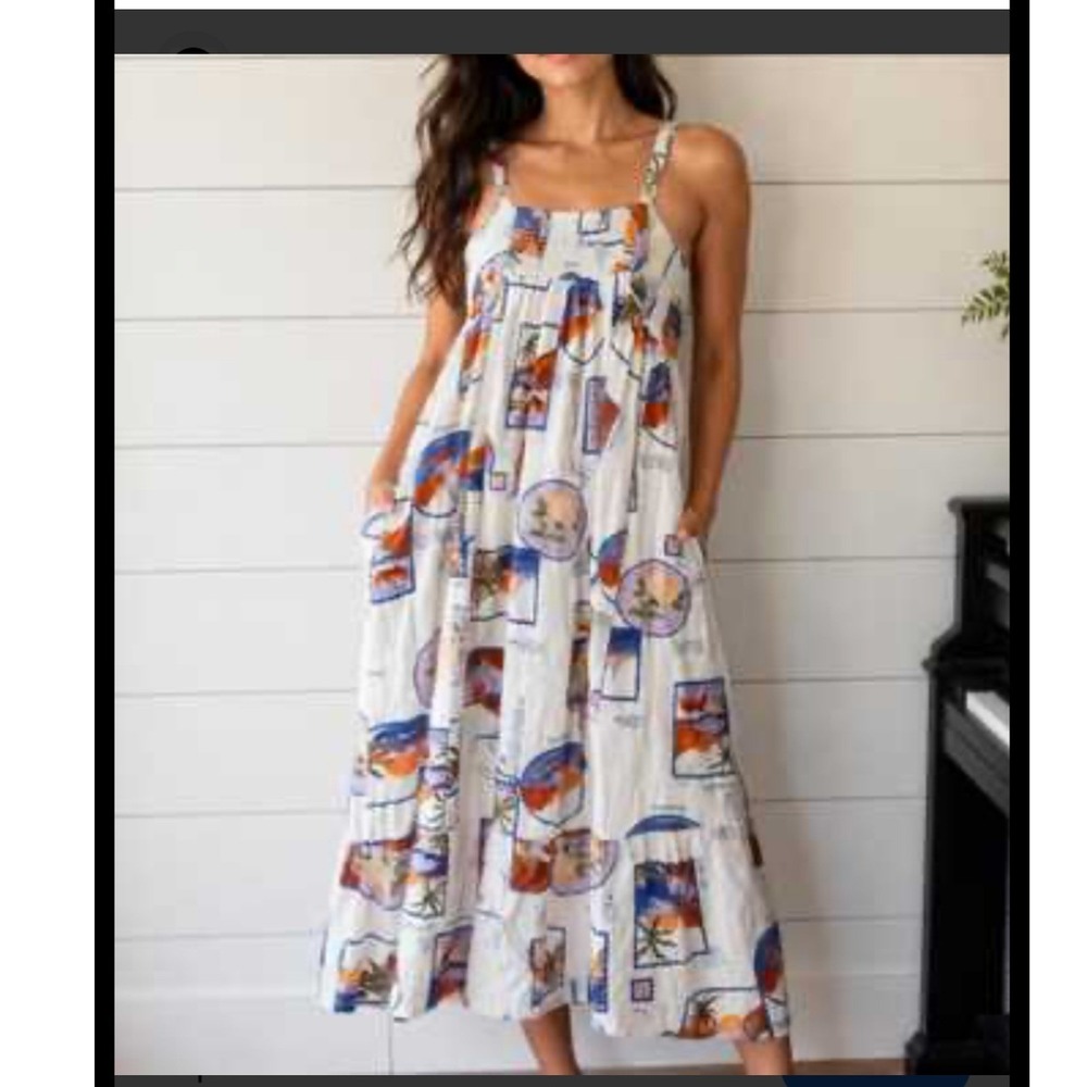 Sleeveless White High-Low Maxi Dress with Blue & Orange Print